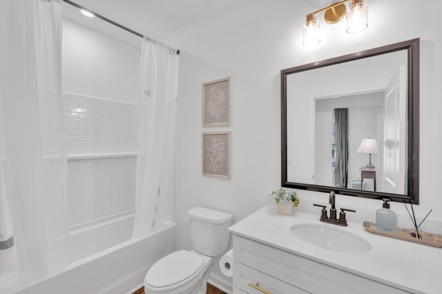 Representative furnished interior of a home built from the Benton II by Great Southern Homes in Springwood Grove, Central (Image 22).