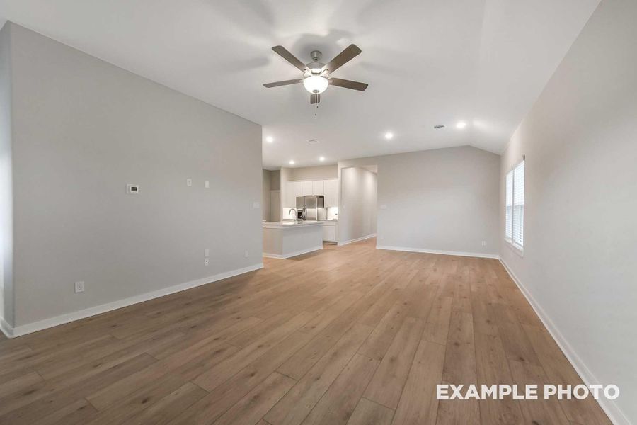 Spacious, unfurnished interior of a new home in Sunterra, Katy (Image 14).