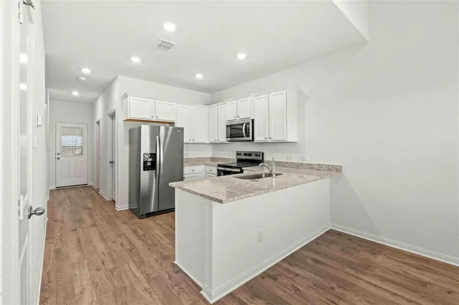 Furnished interior view inside a new home in Cypress Trails at Bauer Landing, Hockley (Image 4). Furnished interior view inside a new home in Cypress Trails at Bauer Landing, Hockley (Image 4).