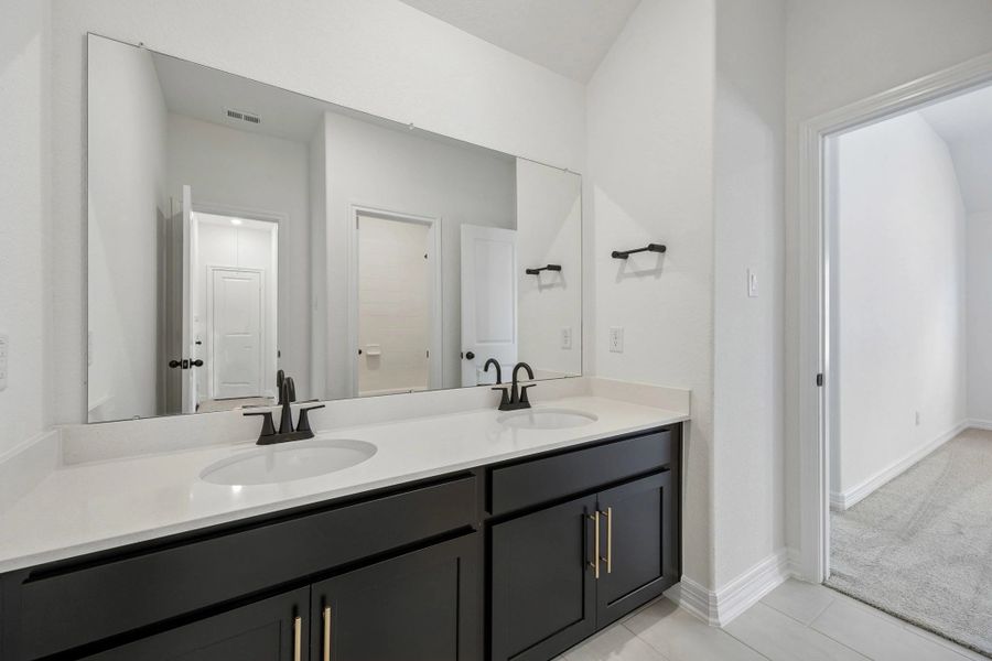 Furnished interior view inside a new home in Westland Ranch, League City (Image 9).