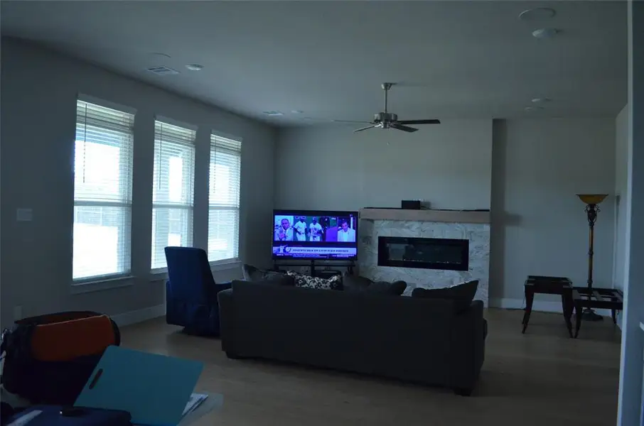 Large windows and electric fireplace Large windows and electric fireplace