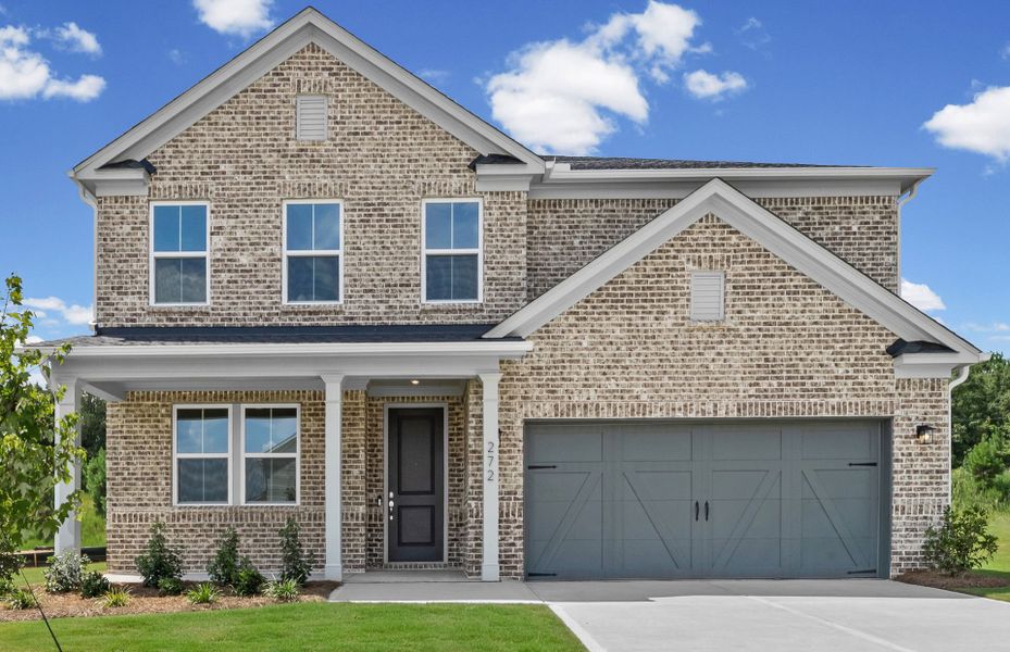 Front exterior of a new home in Overland, Locust Grove, GA, highlighting curb appeal (Image 24).
