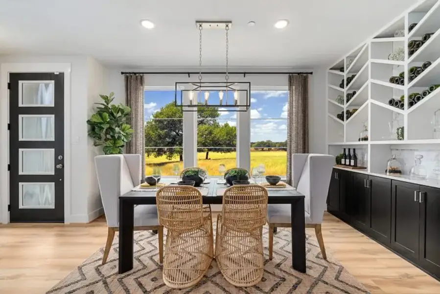 Furnished interior view inside a new home in The Preserve on the Park, Addison (Image 9).