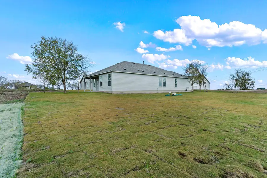 Exterior details and patio area of a home in Schriber Ranch, Mustang Ridge (Image 3).