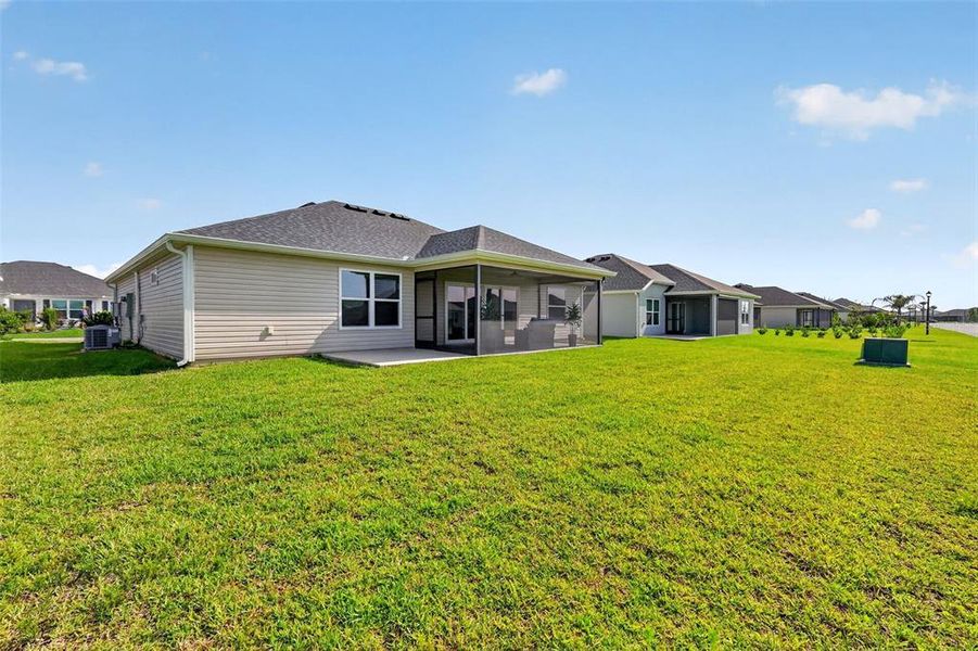 Exterior details and patio area of a home in , The Villages (Image 25). Exterior details and patio area of a home in , The Villages (Image 25).