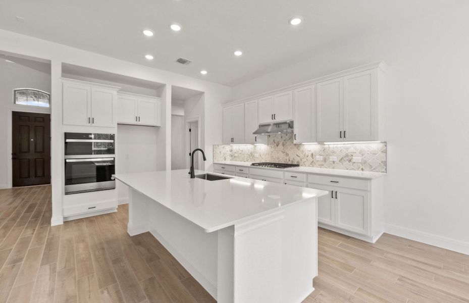 Representative furnished interior of a home built from the Wallace by Pulte Homes in Bluffview Reserve, Leander (Image 12).