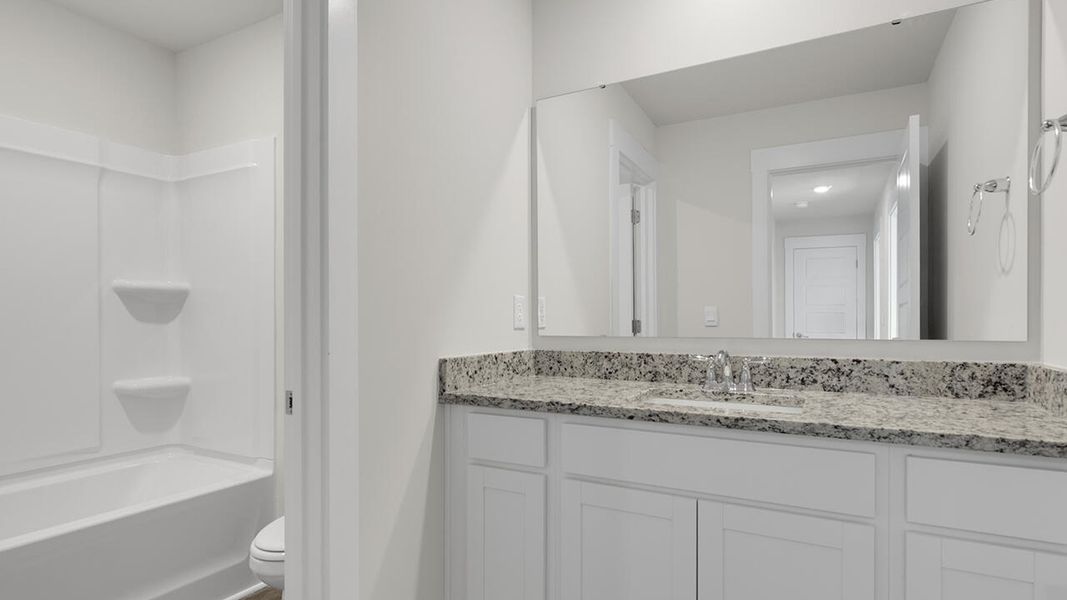 Furnished interior view inside a new home in Sidbury Station, Castle Hayne (Image 14).