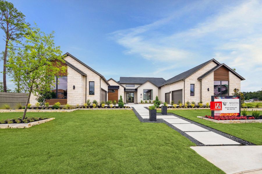 Representative exterior photo of a completed home built from the The Sonoma by Westin Homes in ARTAVIA® - 65' Art Collection, Conroe, TX (Image 24). Representative exterior photo of a completed home built from the The Sonoma by Westin Homes in ARTAVIA® - 65' Art Collection, Conroe, TX (Image 24).