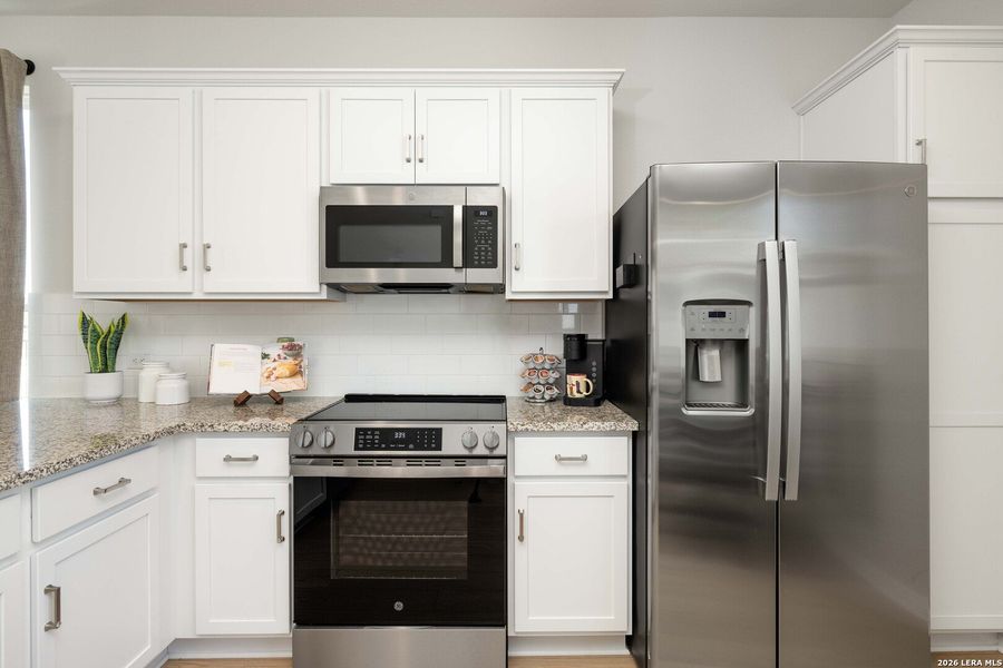 Furnished interior view inside a new home in , New Braunfels (Image 8).