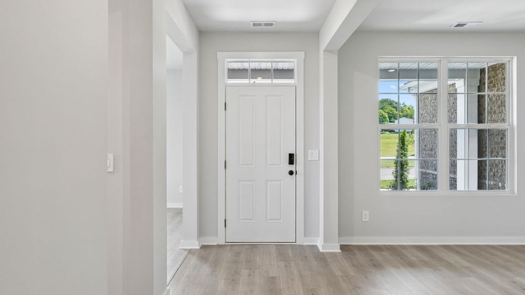 Representative unfurnished interior of a home built from the Ansley by D.R. Horton in Harvest Point, Spring Hill (Image 28).