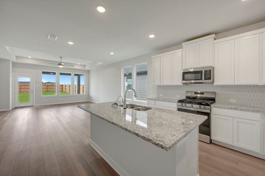 Furnished interior view inside a new home in Mason Woods, Cypress (Image 5).