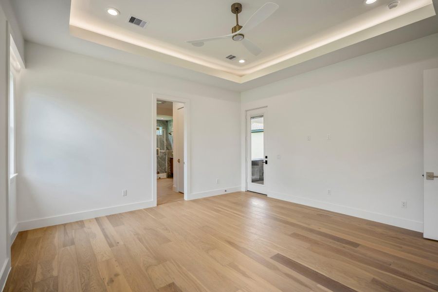 Primary bedroom also has its own private exit to the backyard covered patio and outdoor kitchen. Primary bedroom also has its own private exit to the backyard covered patio and outdoor kitchen.
