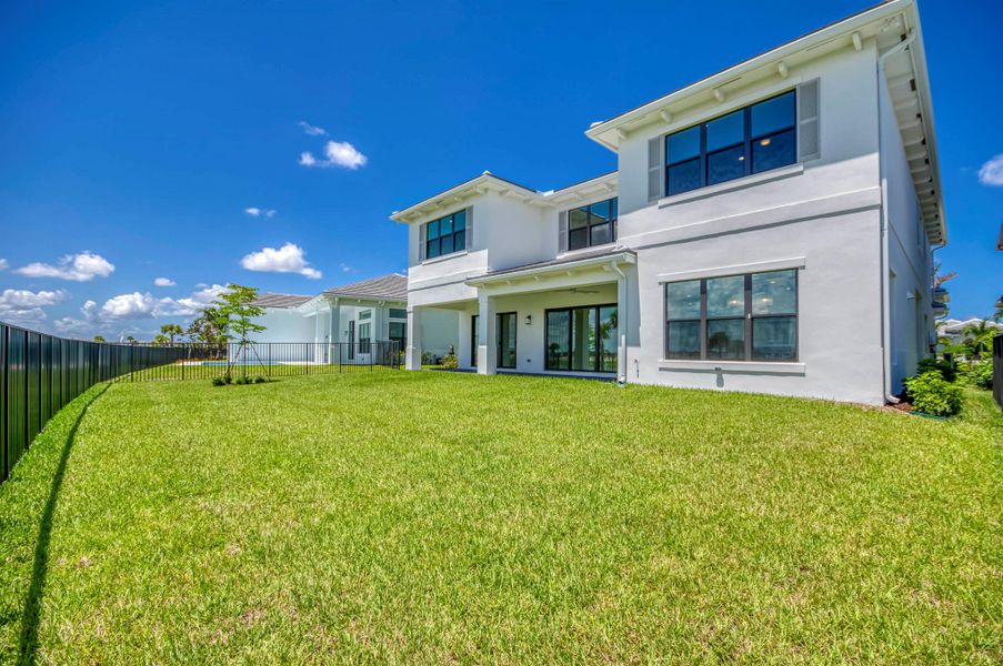 Exterior details and patio area of a home in Apex at Avenir, Palm Beach Gardens (Image 21).