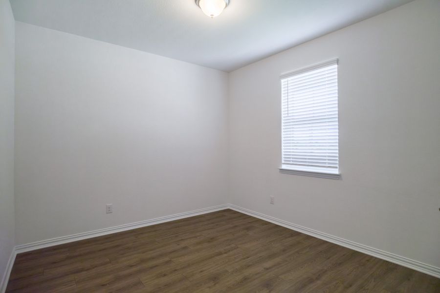 Spacious, unfurnished interior of a new home in The Villages of Hurricane Creek, Anna (Image 31).