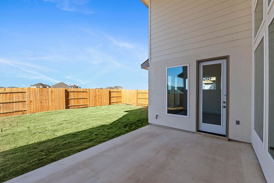 Exterior details and patio area of a home in Lariat, Liberty Hill (Image 4). Exterior details and patio area of a home in Lariat, Liberty Hill (Image 4).