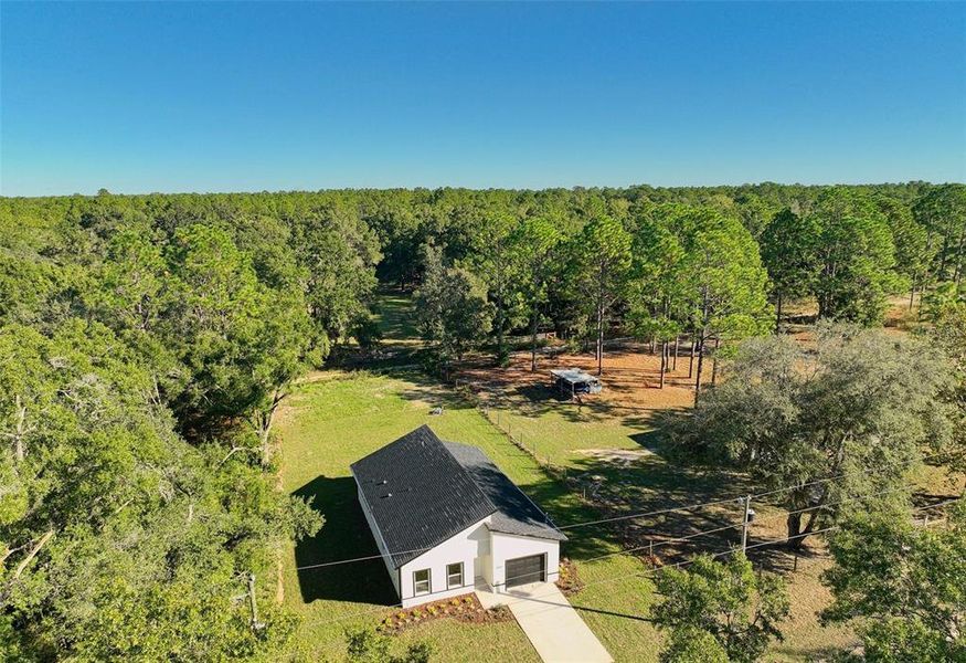 Front exterior of a new home in , Dunnellon, FL, highlighting curb appeal (Image 22).