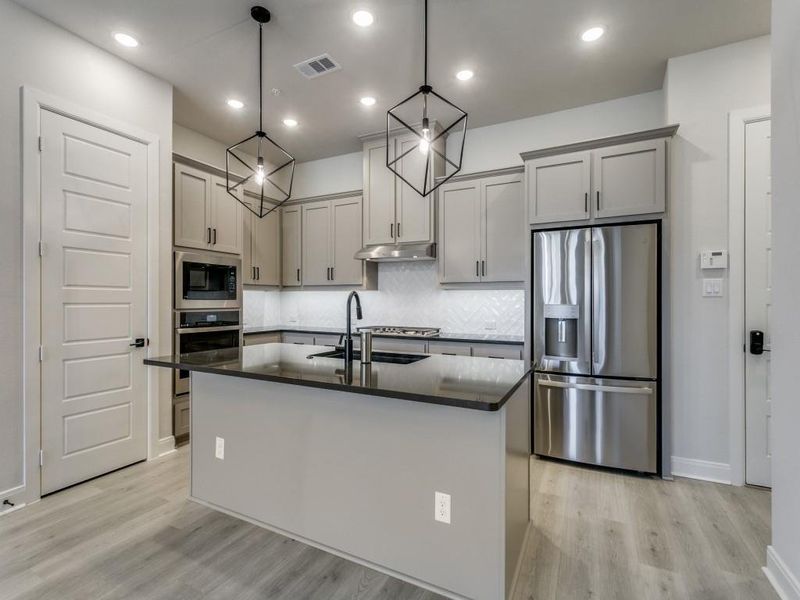 Furnished interior view inside a new home in Hillside at Las Colinas, Irving (Image 24). Furnished interior view inside a new home in Hillside at Las Colinas, Irving (Image 24).