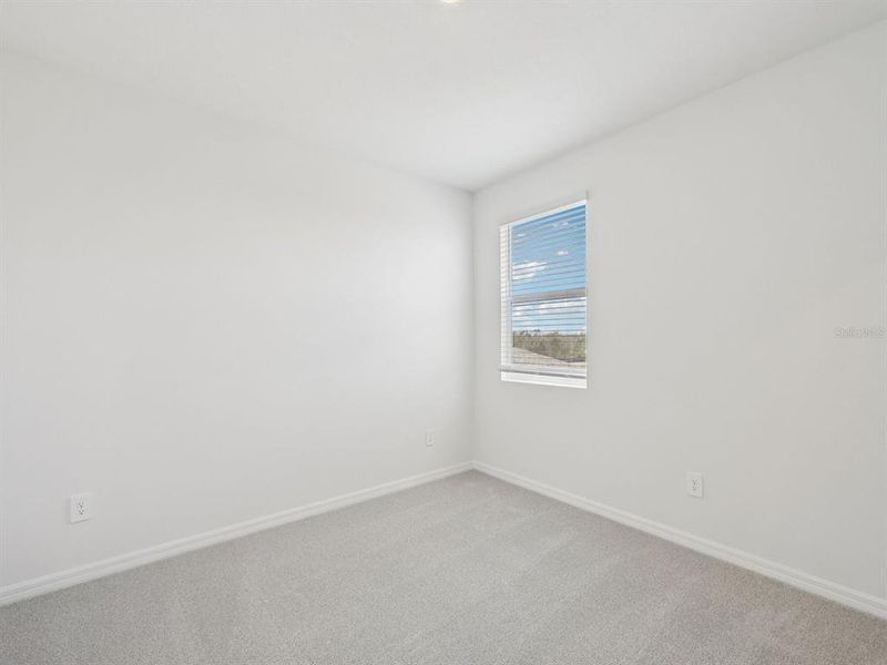 Spacious, unfurnished interior of a new home in Coasterra - Reserve Series, Palmetto (Image 13).