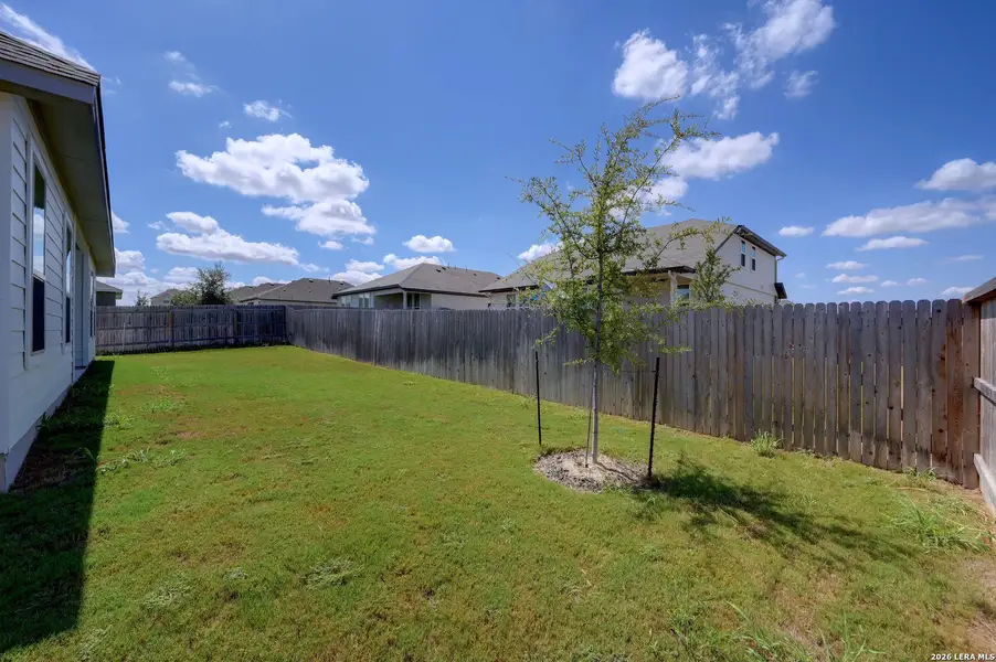 Exterior details and patio area of a home in The Parklands, Schertz (Image 3).