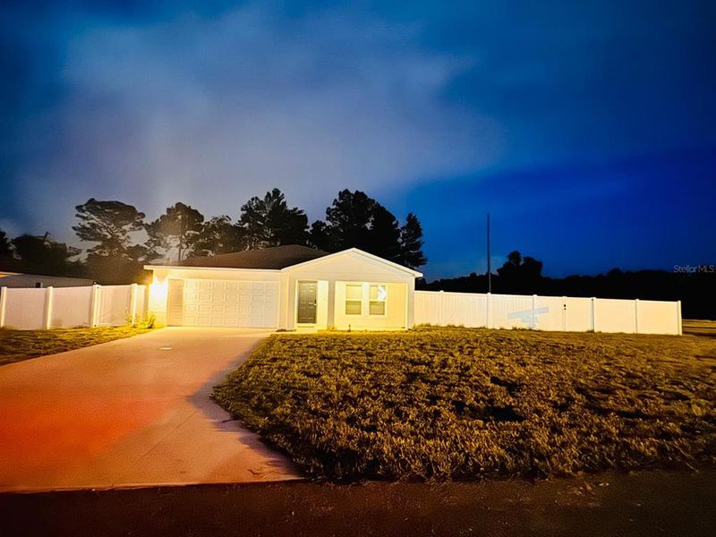 Front exterior of a new home in Marion Oaks, Ocala, FL, highlighting curb appeal (Image 21).