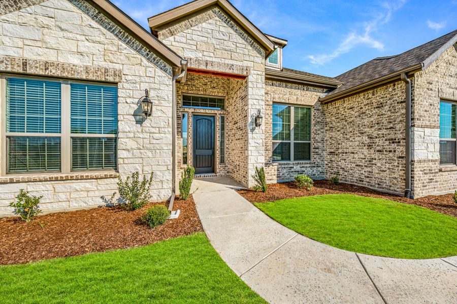 Exterior details and patio area of a home in Creekview Farms, Greenville (Image 3). Exterior details and patio area of a home in Creekview Farms, Greenville (Image 3).