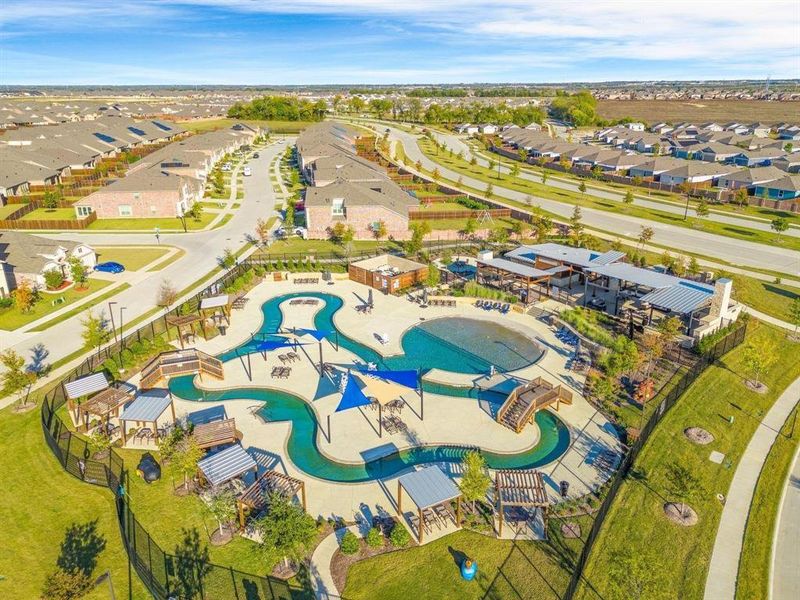 Aerial perspective of suburban area with a pool area Aerial perspective of suburban area with a pool area