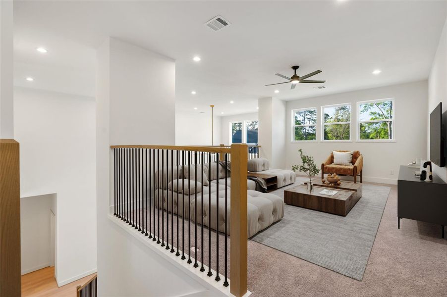 Upstairs, you'll find a versatile family room, two additional bedrooms and bathroom, and closet space for storage. Virtually staged. Upstairs, you'll find a versatile family room, two additional bedrooms and bathroom, and closet space for storage. Virtually staged.