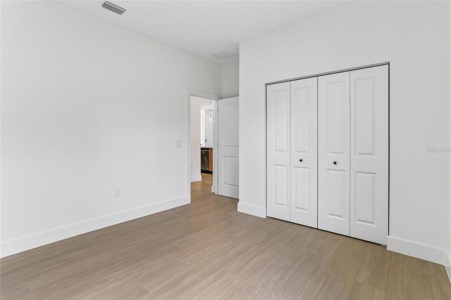 Spacious, unfurnished interior of a new home in , Port Charlotte (Image 39).