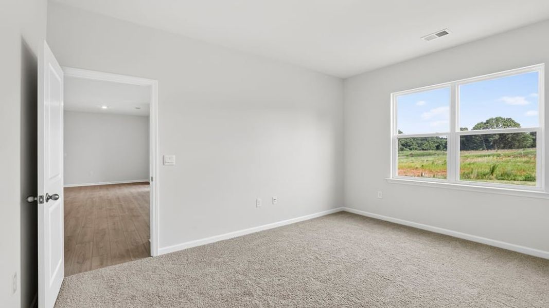 Spacious, unfurnished interior of a new home in Benjamin's Grove, Woodruff (Image 35).