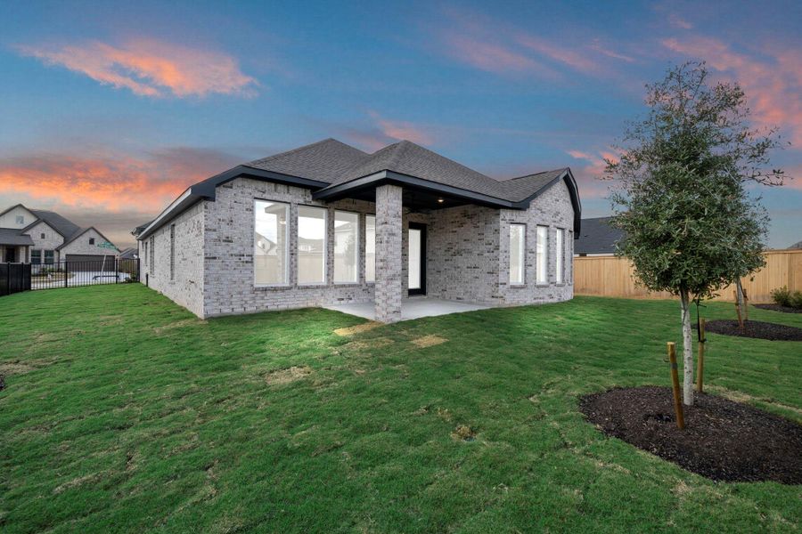 Exterior details and patio area of a home in Bridgeland, Cypress (Image 4).