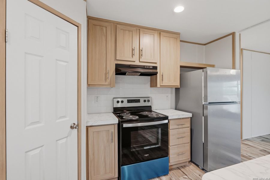 Furnished interior view inside a new home in , Atascosa (Image 6).