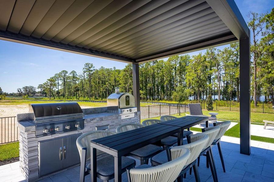 Exterior details and patio area of a home in Solace at Corner Lake, Orlando (Image 24).