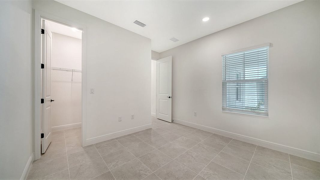 Spacious, unfurnished interior of a new home in Windward Real Estate and Homes for Sale in Sarasota, FL - Neal Communities, Lakewood Ranch (Image 23).