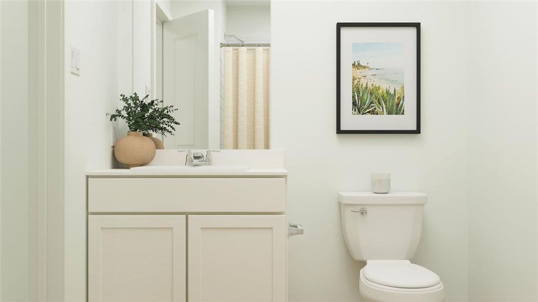 Bathroom with vanity and toilet