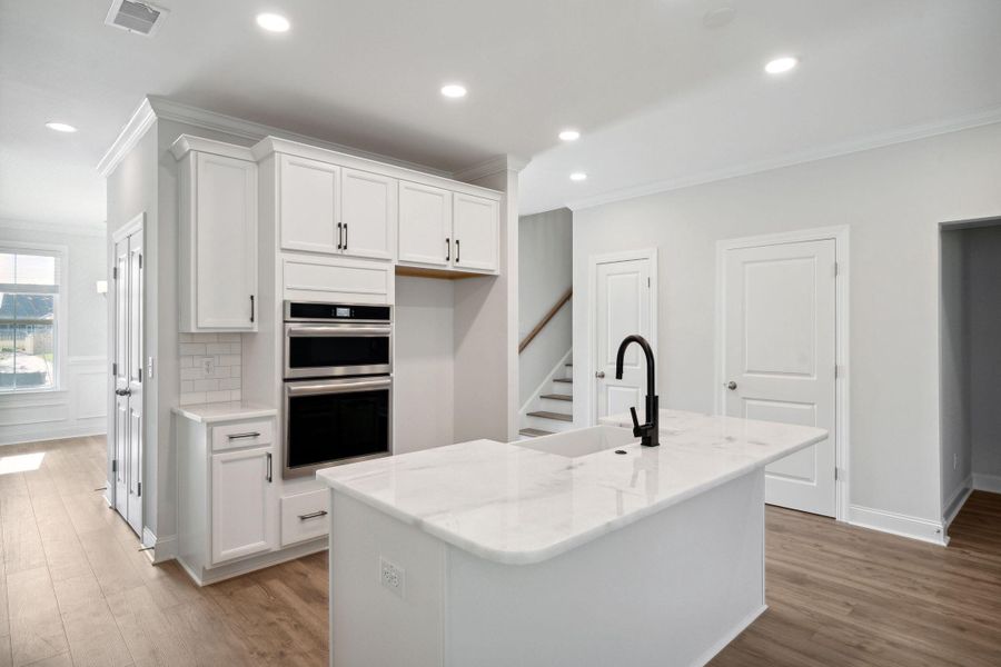 Furnished interior view inside a new home in Tidewater at Lakes of Cane Bay, Summerville (Image 5).