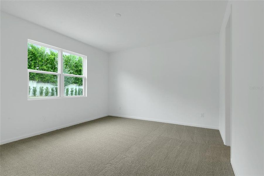 Spacious, unfurnished interior of a new home in Seasons at Grandview Gardens, Deland (Image 11).