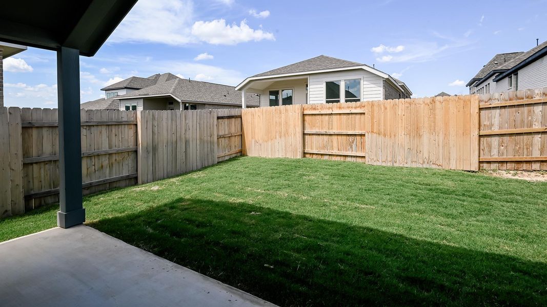 Exterior details and patio area of a home in Crosswinds 40', Kyle (Image 4).