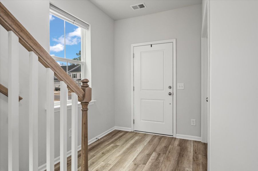 Spacious, unfurnished interior of a new home in Limehouse Village: Arbor Series, Summerville (Image 22). Spacious, unfurnished interior of a new home in Limehouse Village: Arbor Series, Summerville (Image 22).