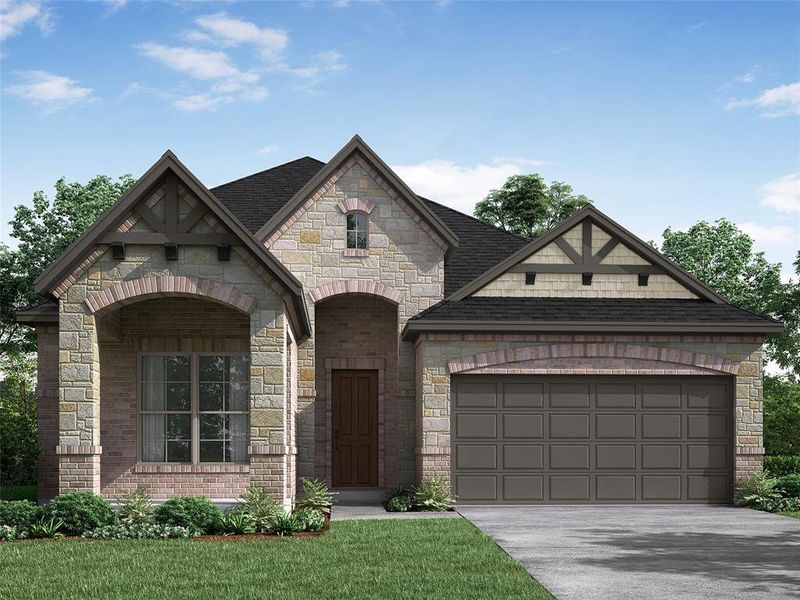 View of front of home with a front lawn and a garage