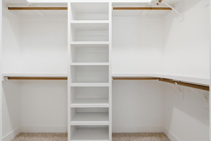 Walk in closet ready for all of your shoes and clothes!