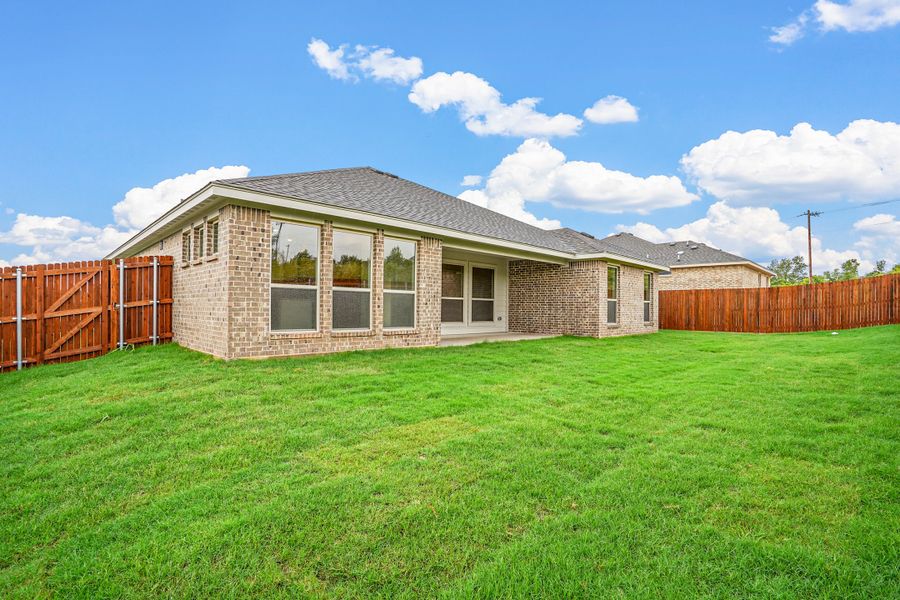 Representative exterior photo of a completed home built from the Waterford III by Cheldan Homes in Stoneview, Glen Rose, TX (Image 29).