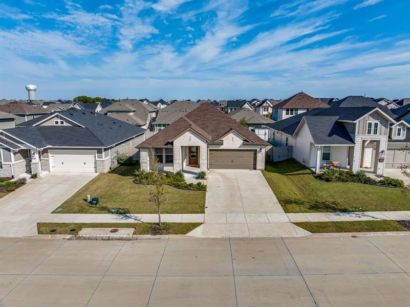 Front exterior of a new home in , McKinney, TX, highlighting curb appeal (Image 2). Front exterior of a new home in , McKinney, TX, highlighting curb appeal (Image 2).