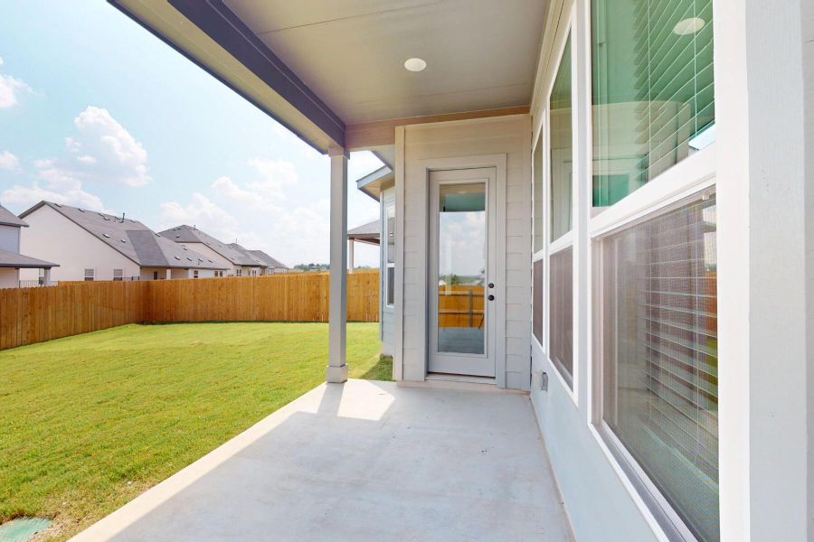 Exterior details and patio area of a home in Cascades at Onion Creek, Austin (Image 18).