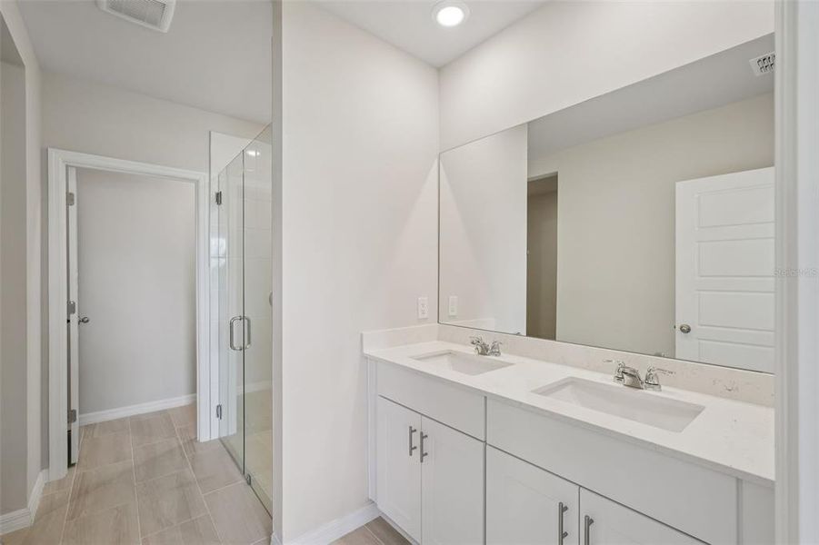 Furnished interior view inside a new home in Crescent Lakes - Premier Series, Punta Gorda (Image 9).