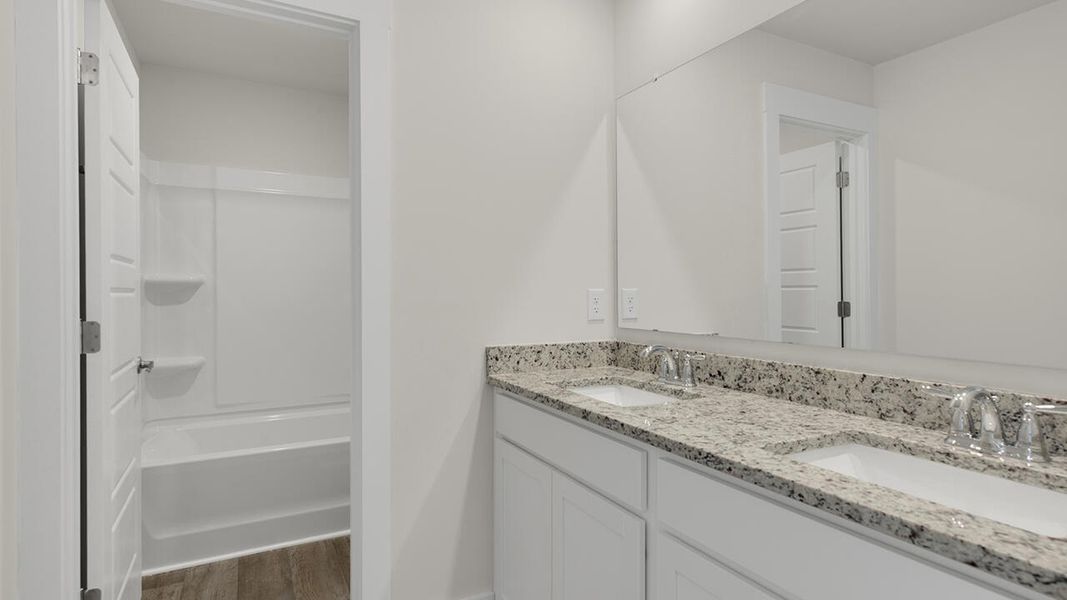 Furnished interior view inside a new home in Sidbury Station, Castle Hayne (Image 12).