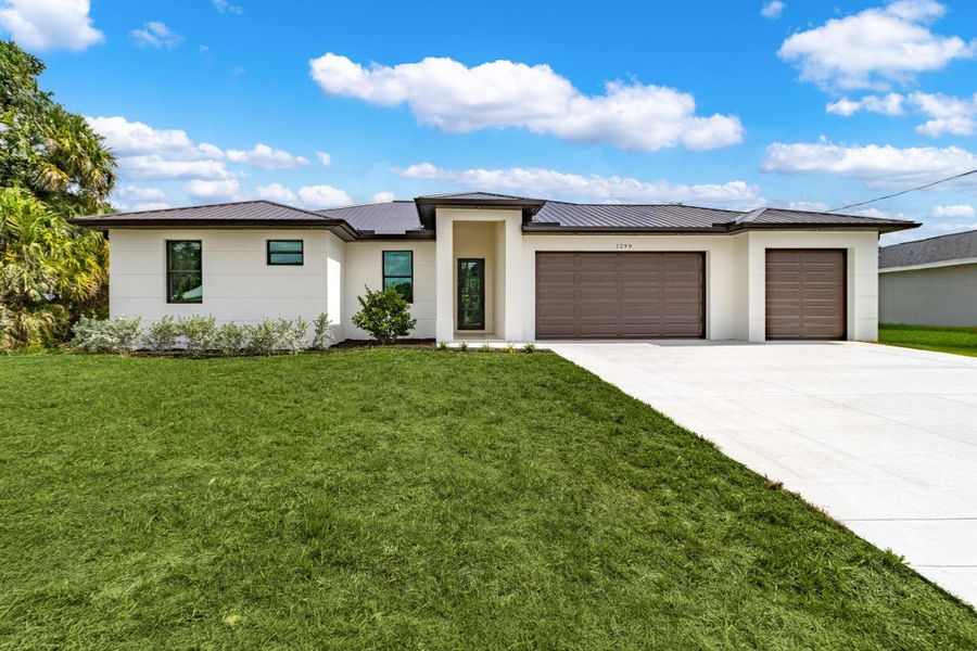 Front exterior of a new home in , Labelle, FL, highlighting curb appeal (Image 20). Front exterior of a new home in , Labelle, FL, highlighting curb appeal (Image 20).