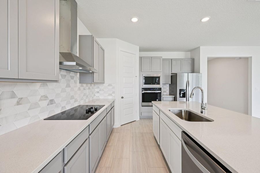 Furnished interior view inside a new home in Hampton Park - Signature Series, Vero Beach (Image 6). Furnished interior view inside a new home in Hampton Park - Signature Series, Vero Beach (Image 6).