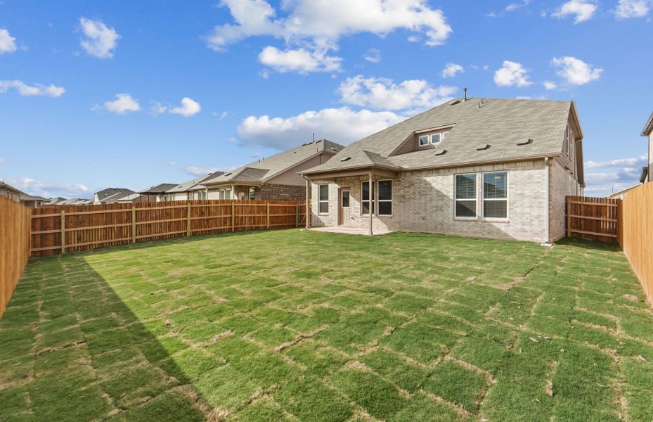 Exterior details and patio area of a home in Lagos, Manor (Image 21).