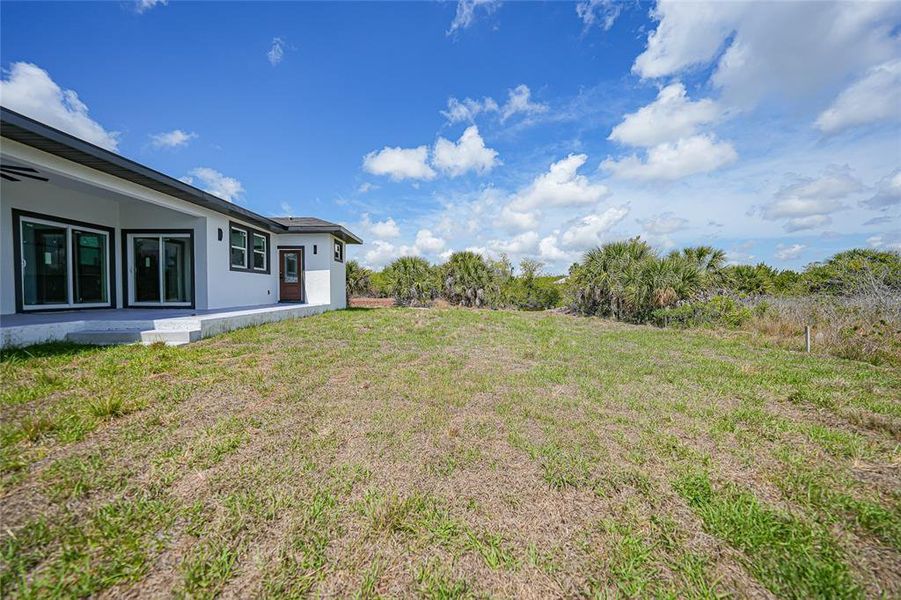 Exterior details and patio area of a home in , Port Charlotte (Image 33).