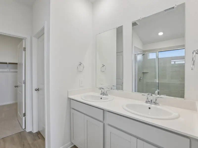 Furnished interior view inside a new home in Lexington Parke, Del Valle (Image 3).
